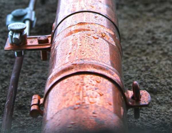 copper pipe with water leaks